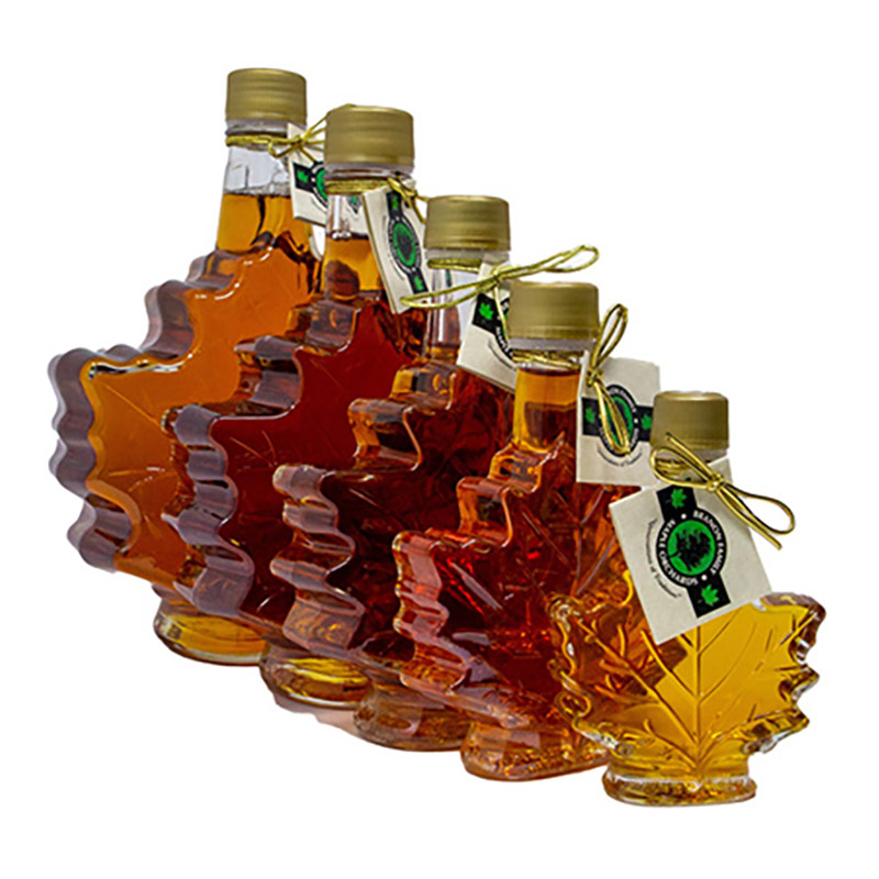 Photo of five Maple Leaf bottles in various sizes