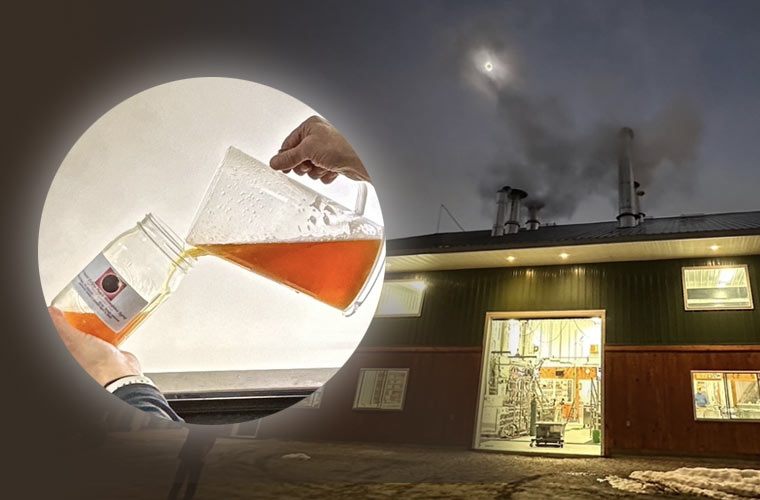 Graphic showing eclipse over sugar house with overlaying photo of syrup