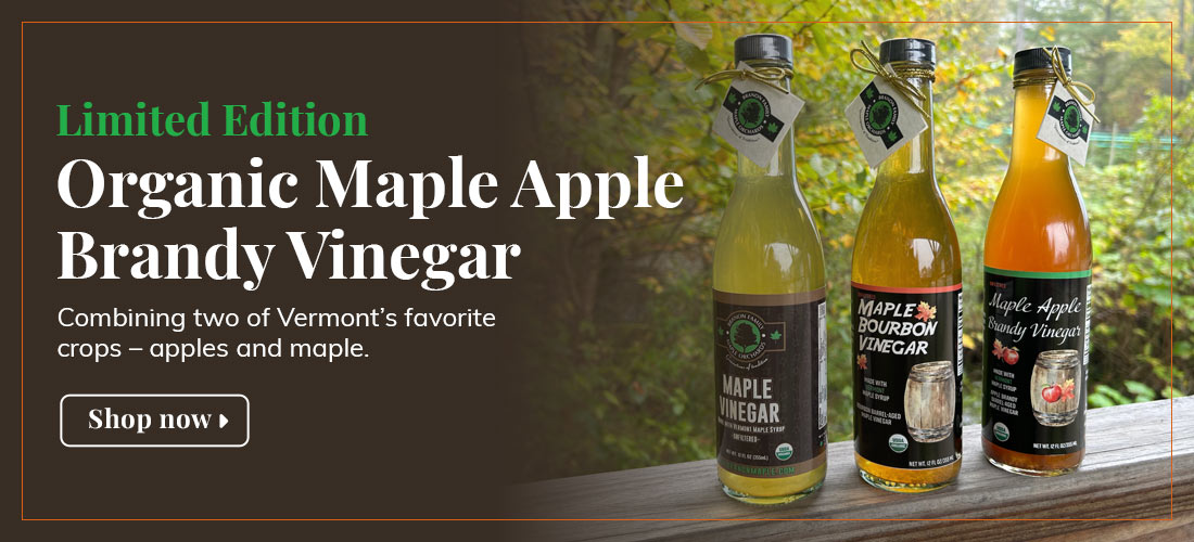 Graphic showing photo of limited edition Organic Maple Apple Brandy Vinegar with overlaying white and green text