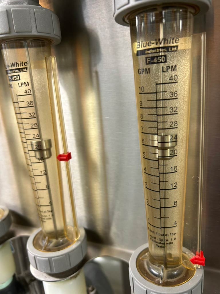 Photo of measuring tubes in sugar house